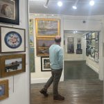 Gallery 1 - Visitor wandering through the galleries of the Yellow Springs Art Show.